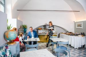 Hostia v ubytovaní Boutique Hotel de la Ville
