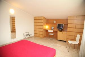 Kuchyň nebo kuchyňský kout v ubytování Hotel Poggio Bertino