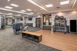 a fitness room with a gym with exercise equipment at Fairfield Inn & Suites Fort Worth Northeast in Hurst