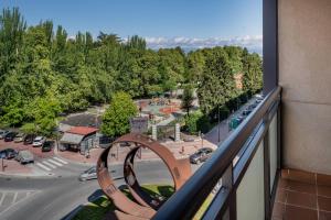 a balcony with a view of a parking lot at AC Hotel Ponferrada by Marriott in Ponferrada