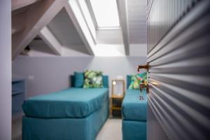 Posteľ alebo postele v izbe v ubytovaní Boutique Hotel de la Ville