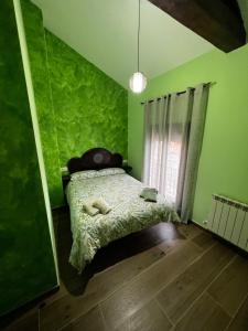 Ein Bett oder Betten in einem Zimmer der Unterkunft Casa Aurora