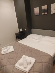 A bed or beds in a room at Fiera City Life 1 Top Apartment
