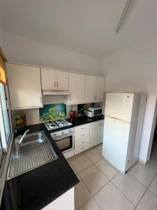 A kitchen or kitchenette at Three Bedroom Casa de Paphos