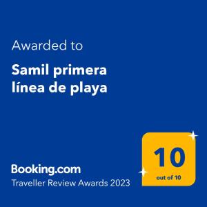a yellow sign that reads awarded to samml primera line de playaza at Samil primera línea de playa in Vigo