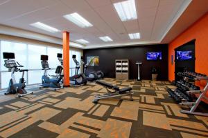 a gym with treadmills and cardio equipment in a room at Courtyard by Marriott Victoria in Victoria