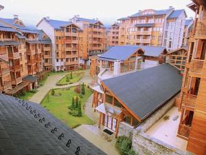 an aerial view of an apartment complex with buildings at Peaceful Condo w/ Amazing View in Bansko