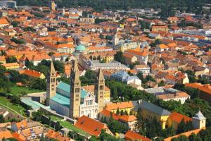 an aerial view of a city with a church at NAPartman Pécs in Pécs