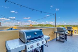 a grill on the roof of a building at Sterling Reef 1407 in Panama City Beach