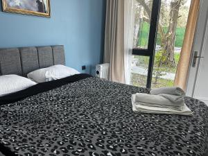 Katil atau katil-katil dalam bilik di Exclusive Bungalow by the Sea