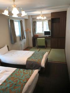 Krevet ili kreveti u jedinici u okviru objekta Hakuba Sun Valley Hotel Annex - Vacation STAY 90351v