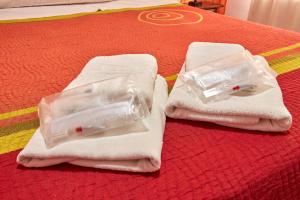 Postel nebo postele na pokoji v ubytování Hotel Virgen de los Reyes
