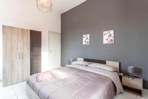Ένα ή περισσότερα κρεβάτια σε δωμάτιο στο Villa panoramica vista mare