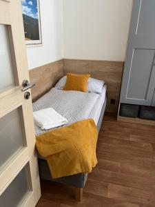 Postel nebo postele na pokoji v ubytování Chalupa U Kříže