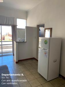 Kuchyň nebo kuchyňský kout v ubytování Sarmiento Monoambiente + 37 fotografií