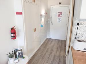 a bathroom with a shower and a toilet and a sink at The Surf Studio - Ericeira in Ericeira