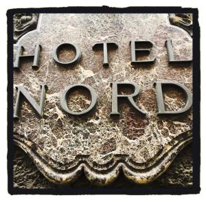 Palkinto, sertifikaatti, kyltti tai muu asiakirja, joka on esillä majoituspaikassa Hotel Nuovo Nord
