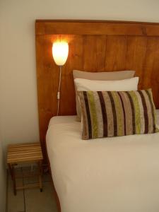 Кровать или кровати в номере Pension Kamperland
