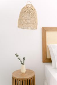 Cama ou camas em um quarto em Olisa Hotel Boutique