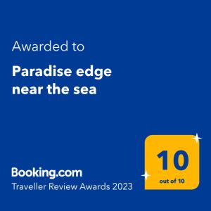Et logo, certifikat, skilt eller en pris der bliver vist frem på Paradise edge near the sea