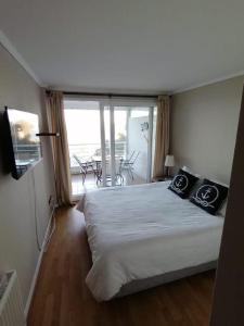 Postel nebo postele na pokoji v ubytování DEPARTAMENTO, COSTA LILENES, Concon + 14 fotografií