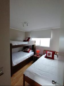 Postel nebo postele na pokoji v ubytování DEPARTAMENTO, COSTA LILENES, Concon