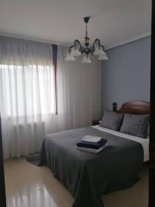 Кровать или кровати в номере O Lar do Suso