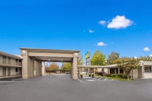 a parking lot in front of a building at SureStay Hotel by Best Western Columbus Downtown in Columbus