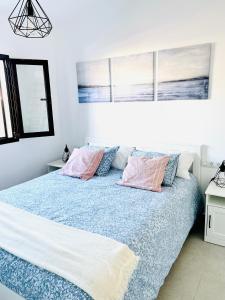 A bed or beds in a room at Villa Paraiso