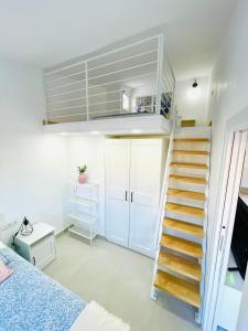 A bed or beds in a room at Villa Paraiso