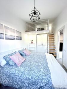 A bed or beds in a room at Villa Paraiso