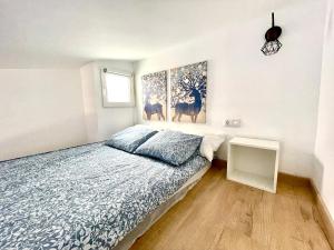 A bed or beds in a room at Villa Paraiso