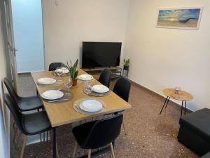 A television and/or entertainment centre at Citadella Apartment