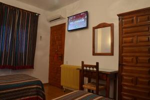 TV a/nebo společenská místnost v ubytování Las Perdices