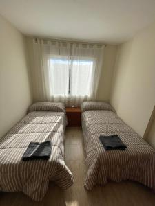 Posteľ alebo postele v izbe v ubytovaní Apartamento residencial en Les Cases D'Alcanar