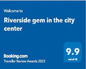 Certifikát, ocenenie alebo iný dokument vystavený v ubytovaní Riverside Gem in the city center