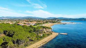 an aerial view of a beach next to the water at appartement résidence La Plage 4 **** in La Londe-les-Maures