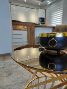 a bowl on a glass table in a kitchen at Long beach luxury Premium apartments in Ulcinj