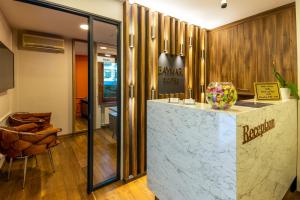 a lobby with a reception desk in a store at BayMari Suites Plus Florya in Istanbul