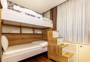 a bunk bed room with two bunk beds at BayMari Suites Plus Florya in Istanbul