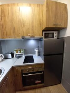 Kitchen o kitchenette sa Apartman 17 Divcibare