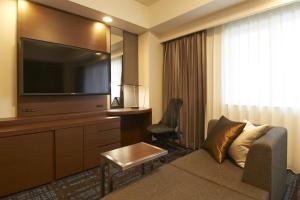 TV a/nebo společenská místnost v ubytování HOTEL VISCHIO AMAGASAKI by GRANVIA