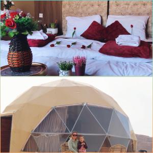 a man and a woman in a dome tent at Warm bubbles Wadi Rum in Wadi Rum