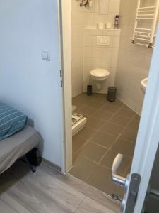 Kúpeľňa v ubytovaní Roland Apartment Downtown - CORVIN