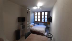 Posteľ alebo postele v izbe v ubytovaní Studio 302 au 15 rue Battant à Besançon