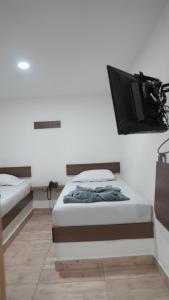 Postel nebo postele na pokoji v ubytování Hotel Salamanca Resort