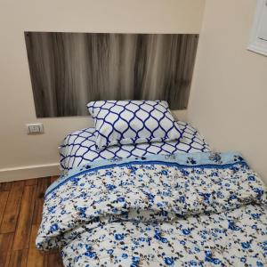 Postel nebo postele na pokoji v ubytování Economy Pyramids Inn