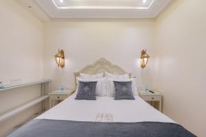 Postel nebo postele na pokoji v ubytování HOTEL RIAD CHAMI