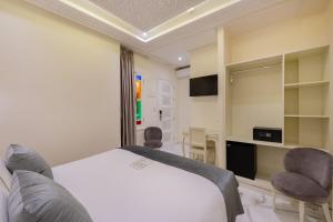 TV a/nebo společenská místnost v ubytování HOTEL RIAD CHAMI