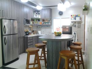 Ett kök eller pentry på Sir Nico Guesthouse and Resort